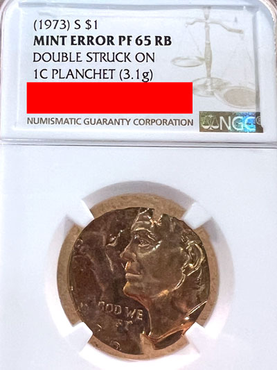 Mint Error 1973 Eisenhower dollar struck on one cent planchet Mint Error 1973 Eisenhower dollar struck on one cent planchet